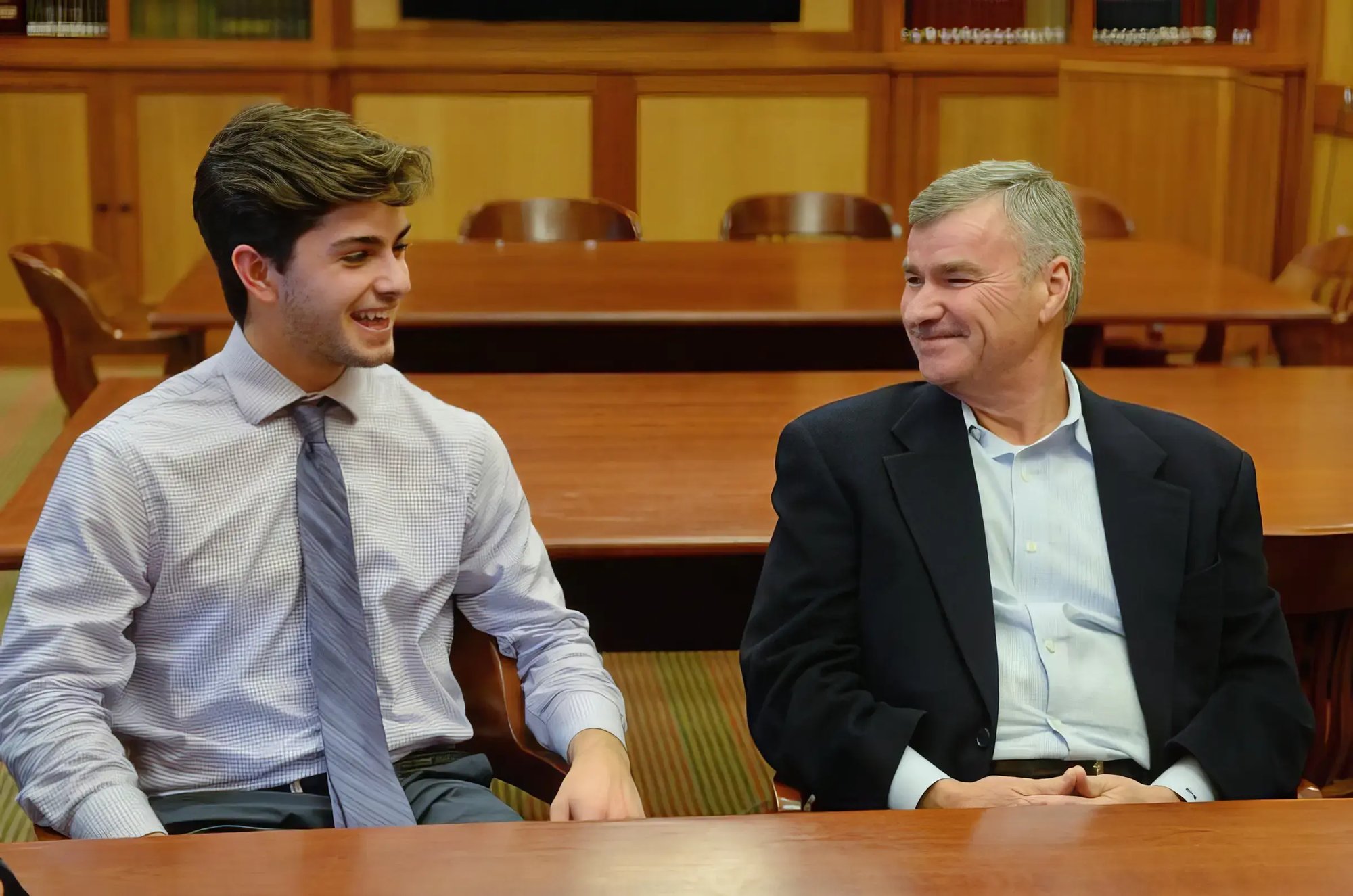 Mr. Michael D. White '70 and student smiling