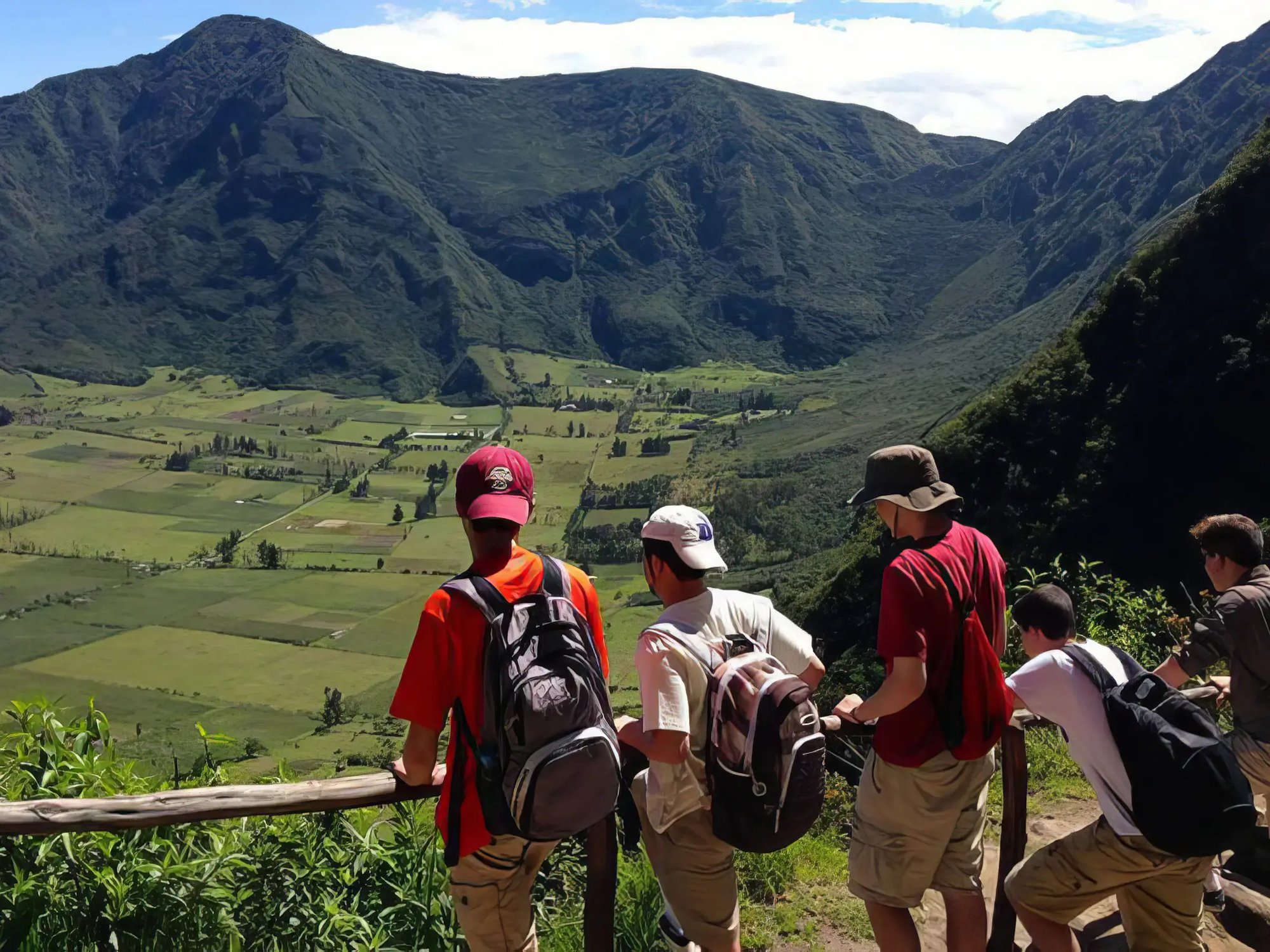 Students overlooking scenic mountain view while hiking