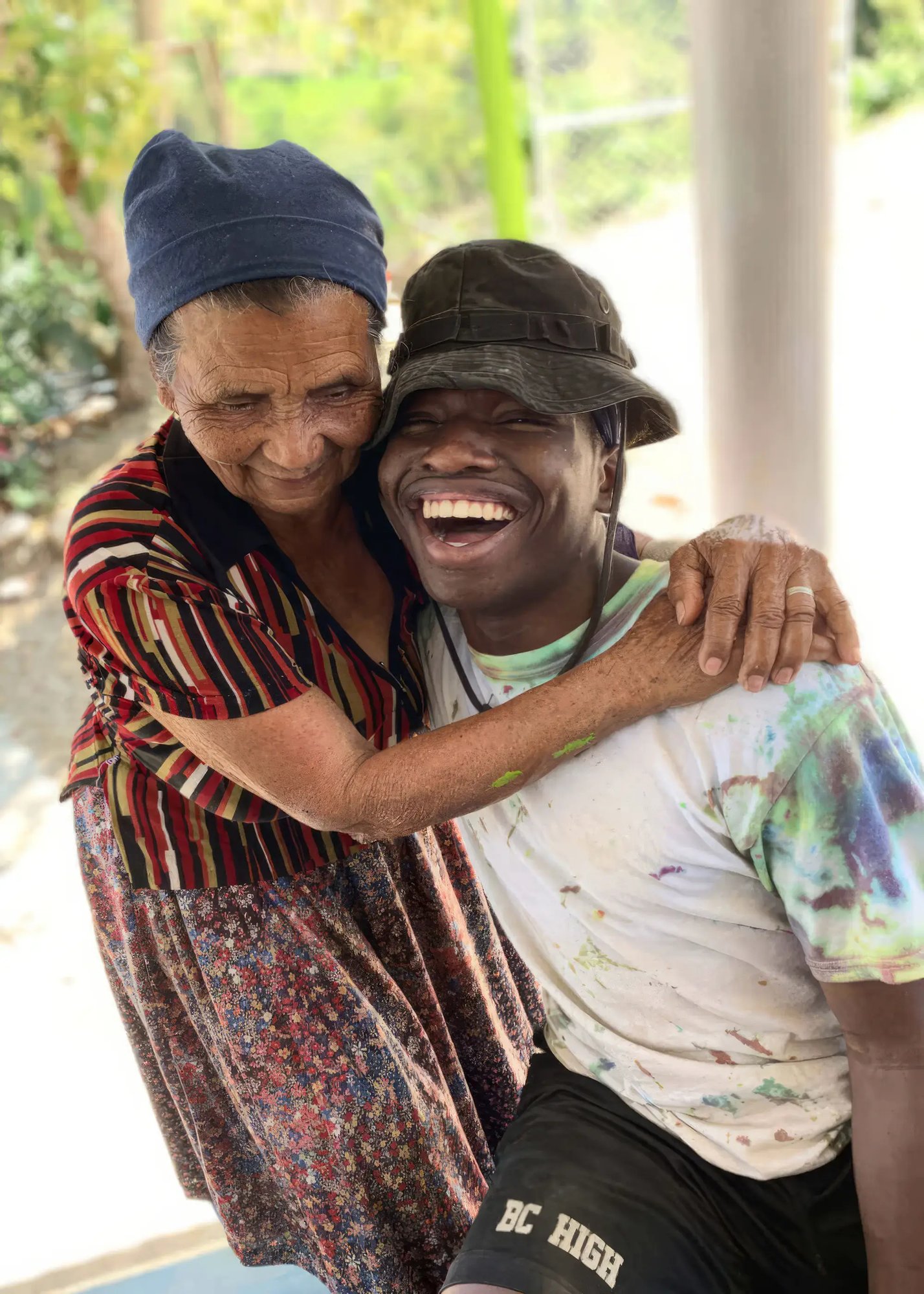 Student abroad posing with woman, smiling